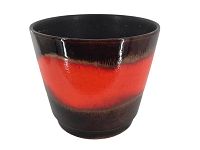 Front view of the pottery planter showing the wide vibrant orange lava glaze band with darker brown edging.