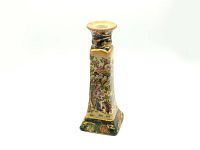 Front view of the Royal Satsuma candle holder showing detailed hand painted Japanese scenes, tapered square shape with a round top opening for candle placement.