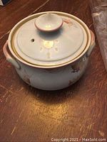 Denby Twilight ceramic pot with lid, showing floral pattern and handles