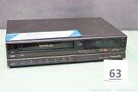 Front angle showing the entire Panasonic Omnivision VHS Player/Recorder model PV-1366 with visible buttons and label.
