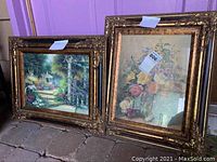 Two framed art pieces side by side showing horizontal and vertical artwork with ornate gold frames against a purple background.