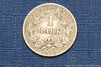 Reverse side of 1876 German 1 Mark Silver Coin showing denomination and date.