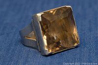 Close-up of the large square citrine gemstone set in silver.