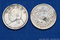 Pair of Chinese Yuan Shih-Kai silver coins, front and back views showing portraits and Chinese characters with laurel wreaths.