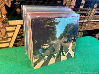 Front view of stack showing The Beatles Abbey Road cover at front