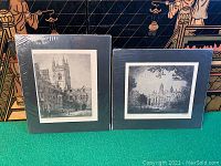 Both antique engravings shown side by side, matted in dark green and shrink wrapped