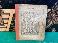 Front cover of the book showing title, author, and illustrated animals around a lion bust.