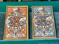 Front covers of 1876 and 1877 Public Ledger Almanacs showing detailed color artwork and title