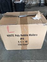 Closed cardboard box labeled WHITE Poly Bubble Mailers #0 6.5 x 10 250/Case
