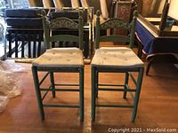 Front view of both chairs with temporary cushions showing overall height, back design, and seat shape