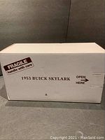 White box labeled '1953 Buick Skylark' with fragile handling sticker