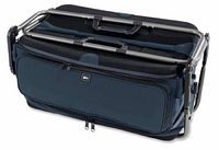 Folded REI Camp Mini Kitchen showing compact form and integrated handles for carrying.