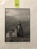 Photo of a black and white photographic print showing the Church of the Transfiguration. The photo is numbered 01/75 and signed J. Poole beneath the image.