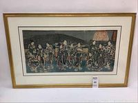 Full view of framed triptych print mounted behind glass