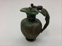 Front right angled view of vessel showing overall body and patina