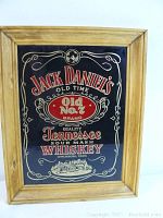 Full view of the Jack Daniels framed bar sign showing the entire design and wooden frame.