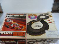 Box with Tyco Pro Super 4-Lane HO Racing set artwork showing track layout and cars