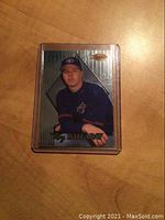 Front view of 1999 Bowman's Best Roy Halladay baseball rookie card in clear plastic protective casing, showing player in blue uniform and cap.