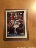 Front view of 1993 Topps Shaquille O'Neal rookie basketball card showing player in Orlando Magic jersey during gameplay.