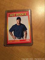 Front of the Brett Lawrie 2012 Score Hot Rookie baseball card with full color image and red header