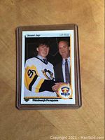 Front of the 1990 Upper Deck Jaromir Jagr rookie hockey card showing player image, team, and draft logo.