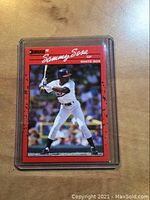 Front view of 1990 Donruss Sammy Sosa baseball rookie card showing player batting image and card details