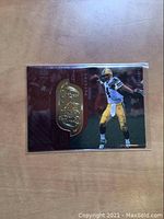 Front of the Brett Favre 1998 Upper Deck SPx Finite football card showing the player in Green Bay Packers uniform with gold embossed logo