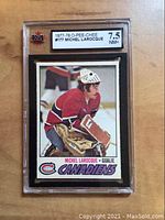 Front of the Michel Larocque hockey card showing him as a goalie in Canadiens gear.