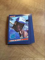 Front of 1986 Leaf baseball card showing Fred McGriff holding bat in blue Toronto Blue Jays uniform with Rated Rookie logo in bottom left corner.