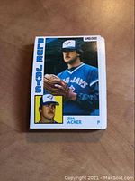 Front view of 1984 O-Pee-Chee baseball card of Jim Acker in Blue Jays uniform.