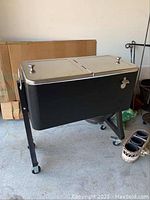 Front-side view of assembled cooler on legs