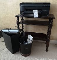 Overall shot of the lot showing printer on the wooden table, shredder, and wastebasket nearby.
