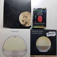 Three boxed items: Mini USB Himalayan salt lamp, Moko smart LED bedside lamp, wake-up light alarm clock