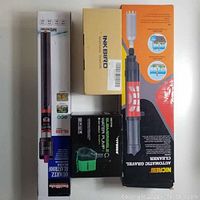 Top view of four boxed aquarium items including Inkbird thermostat, Seabillion heater, Vivosun pump, Nicrew gravel cleaner