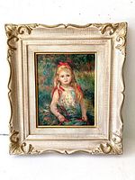 Front view of framed Renoir girl print showing full artwork and decorative frame.