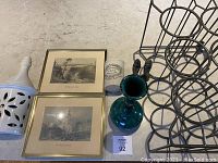 All items in the lot displayed showing crock jar, prints, green vase, applique, wine rack and bird figurines