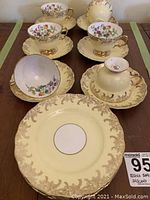 Full lot with six cups, saucers, and side plates
