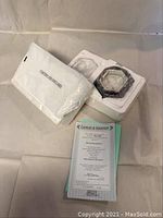 Porcelain music box with certificate of authenticity and original packaging.