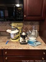 Overview of all three appliances and accessories on countertop