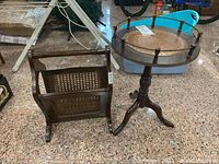 Magazine rack and side table shown together on floor, shows size and relative height