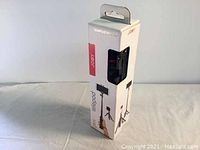 Boxed Joby TelePod Mobile selfie stick tripod in white box with red branding, showing product images and logos.