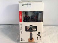 Image of the full boxed kit showing Joby GorillaPod Action GripTight Kit with Bluetooth remote for smartphone and action camera