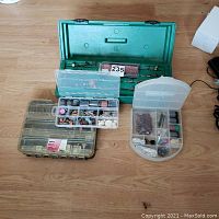 Green Mastercraft carry box open showing rotary tool accessories stored inside.