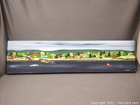 Full view of the 6x24" horizontal folk art acrylic painting showing a panoramic landscape with a waterfront and buildings.