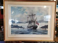 Full view of framed print including frame, mat, and glazing
