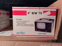 Photo of the Action 5" B/W TV original box showing product image and features.