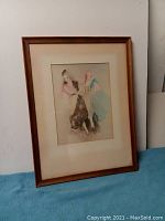 Frontal view of the matted watercolor artwork in wooden frame with glass, showing the entire piece.