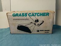 Full view of original sealed box showing the product image and branding.