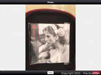 Carrying case opened showing user manual for Beats by Dre headphones.