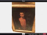 Framed artwork showing full portrait with gold-toned frame, some frame wear visible.